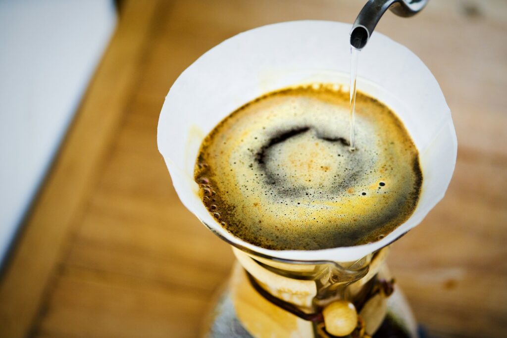 Coffee being poured into a cup